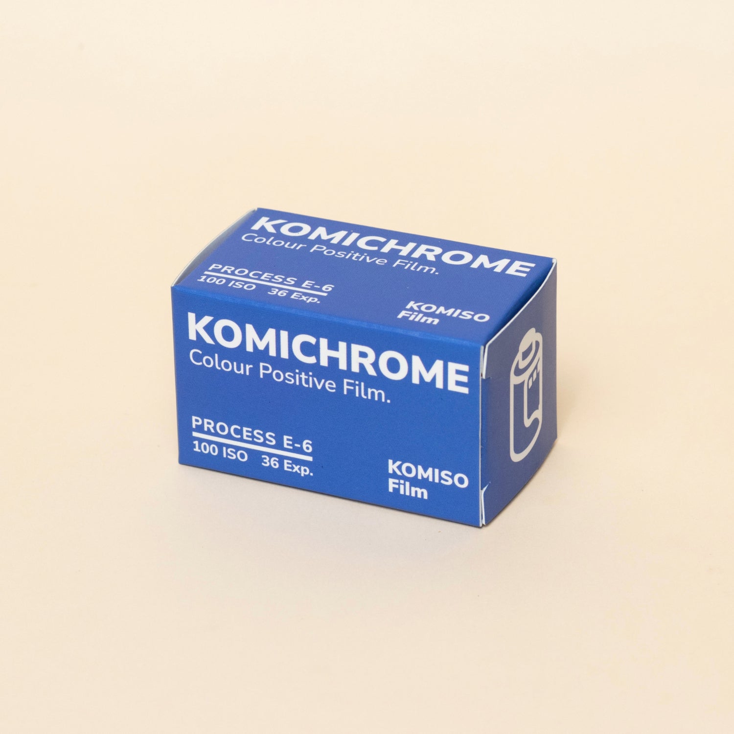 KOMICHROME 100 color slide film box with medium grain, 100 ISO, E-6 process, 36 exposures, produced by KOMISO Film.