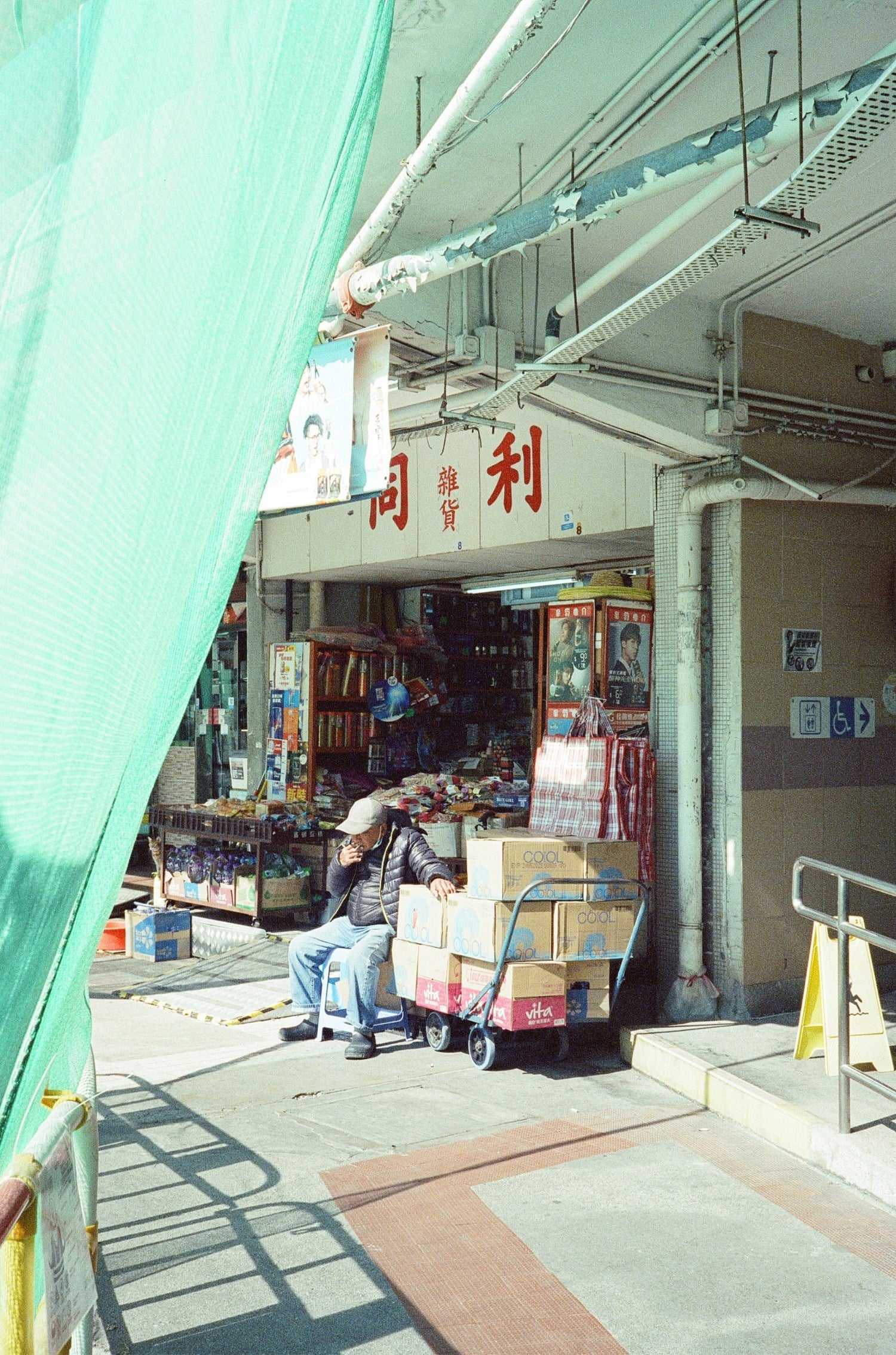 Night market scene captured with MISO 400 film high grain.